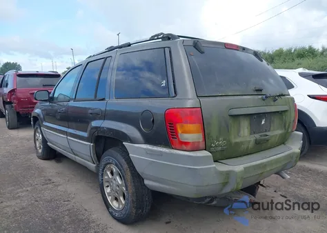 1999 Jeep Grand Cherokee Laredo from USA, damaged, VIN 1J4GW58NXXC736618